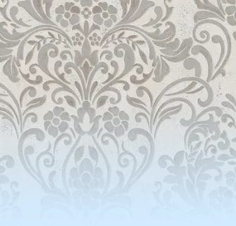 A close up of a white and grey floral pattern