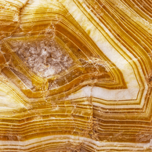 Striped yellow and white agate texture.