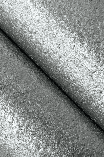 Silver textured fabric, folded.