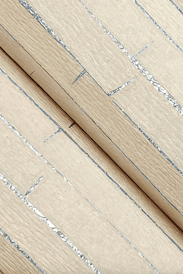 Beige wood grain wallpaper detail.