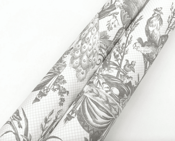 Grey toile fabric rolls, peacocks, birds.