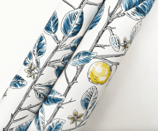 Blue and yellow lemon branch wallpaper.