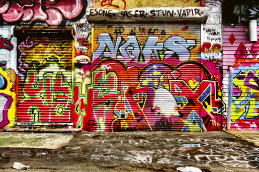 Colorful graffiti on metal shutters.