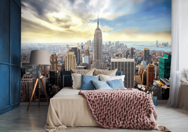 NYC skyline mural on bedroom wall.