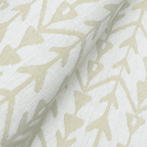 Beige ikat fabric with arrow pattern.