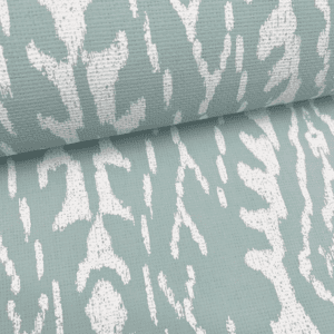 Teal fabric with white ikat pattern.