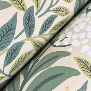 Beige background with green leaf pattern.