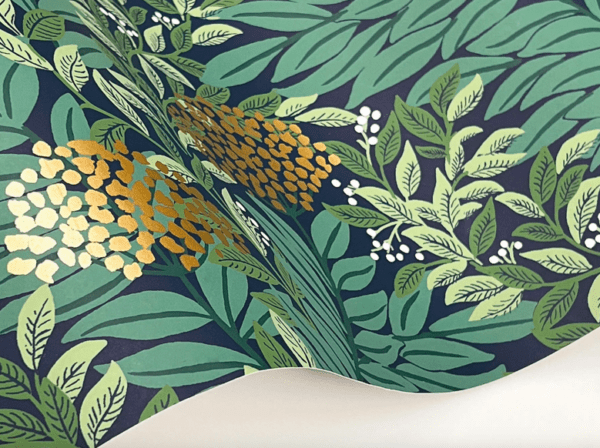 Dark green gold floral wallpaper.