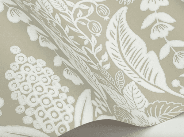 Beige floral wallpaper with white print.