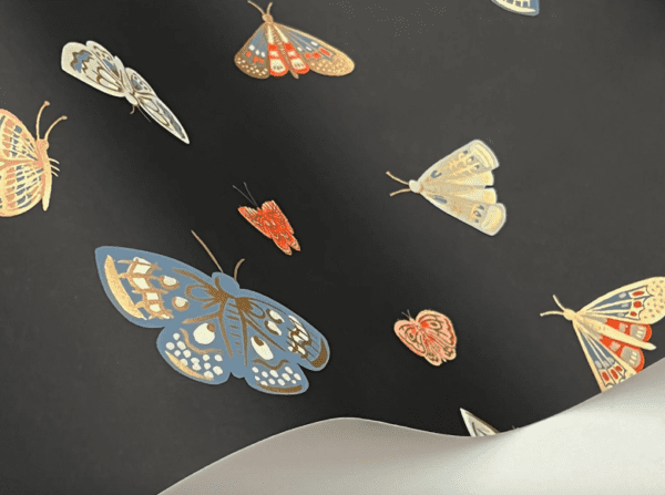 Black wallpaper with colorful butterflies.