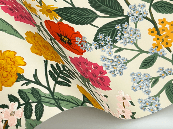 Cream floral wallpaper with vibrant blooms.