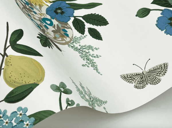 Floral wallpaper with lemons and butterflies.