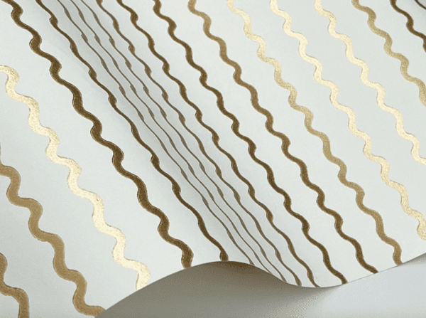 Gold wavy lines on white wallpaper.