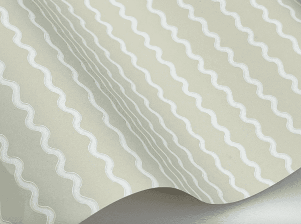 Beige wallpaper with white wavy lines.