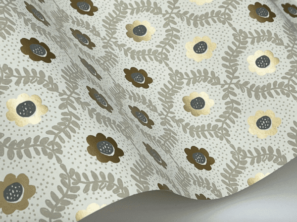 Gold and grey floral wallpaper roll.