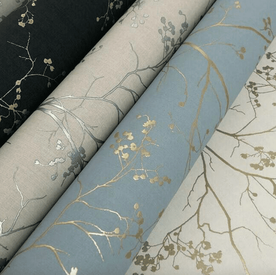 Gold leaf branch wallpaper rolls.