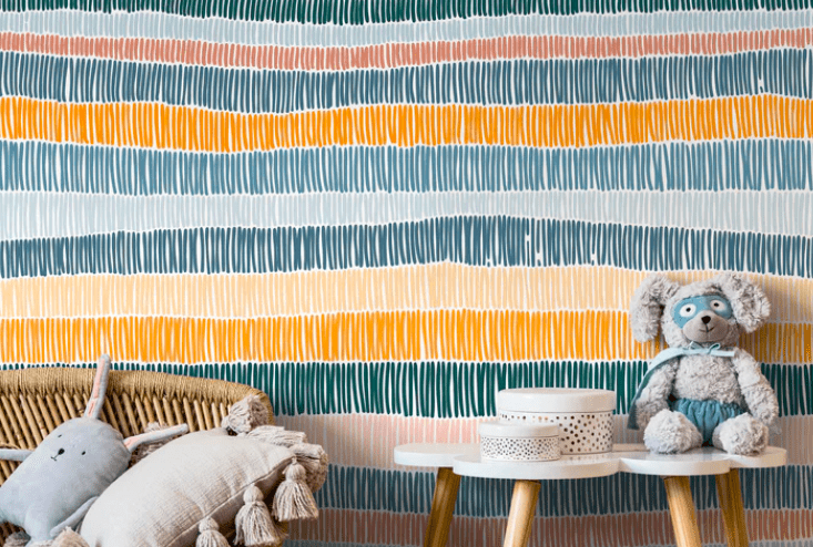 Colorful striped kids' room wallpaper.