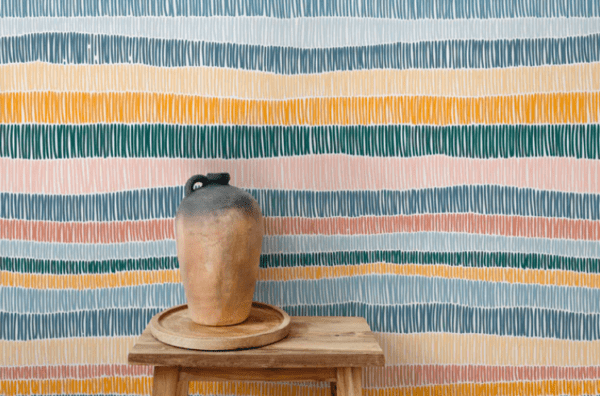 Pastel striped wallpaper with clay pot.