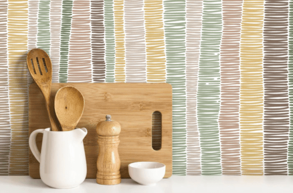 Neutral colored patterned wallpaper.