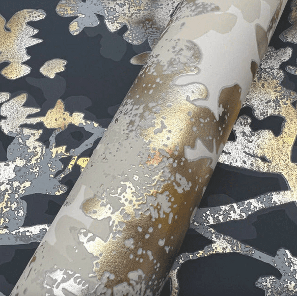 Gold and grey metallic wallpaper roll.